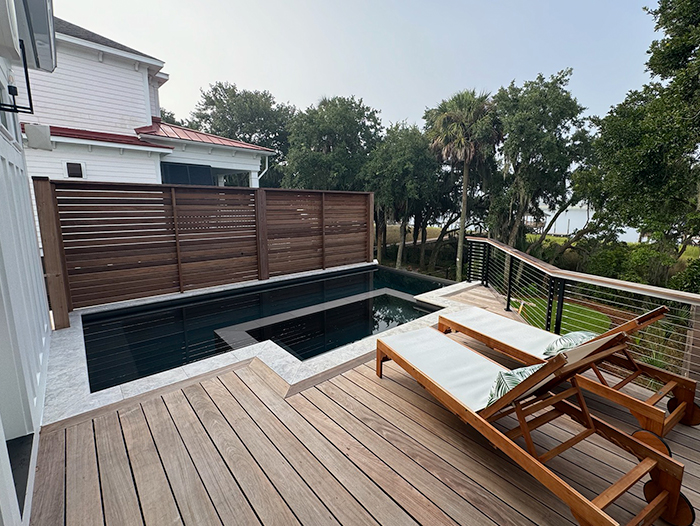 Wood decking boards installed for backyard deck