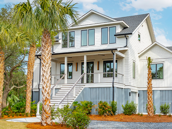 Durable fiber cement siding installed on house exterior