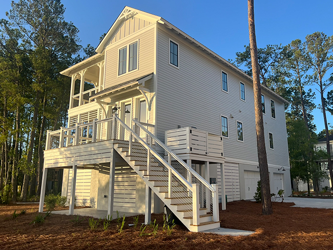 Home exterior finished with fiber cement siding panels