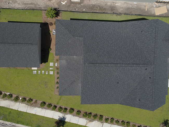 Residential home featuring modern metal roofing panels