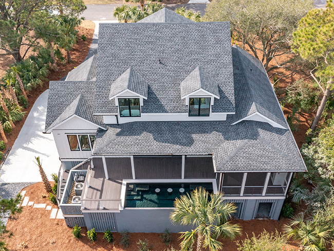 Installing durable metal roofing panels on residential structure